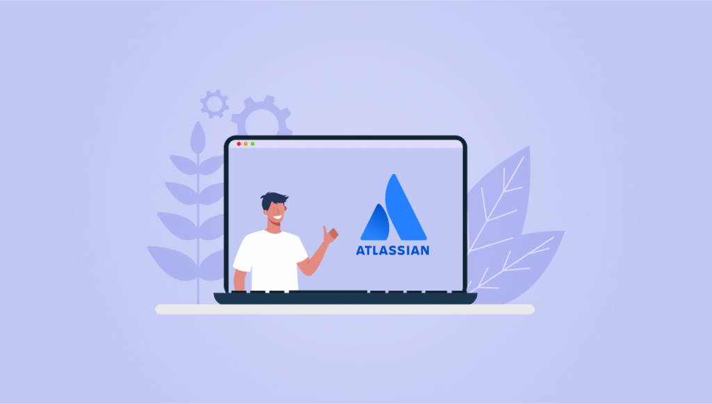 Person on laptop next to Atlassian logo